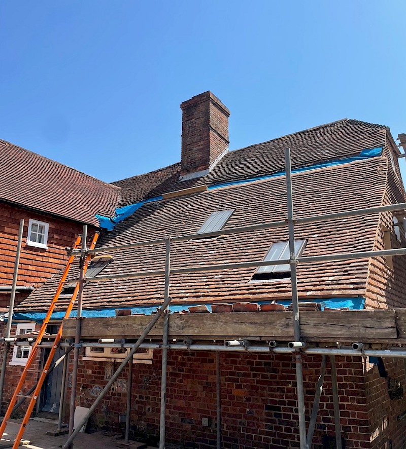 Access towers in place for professional roof moss removal